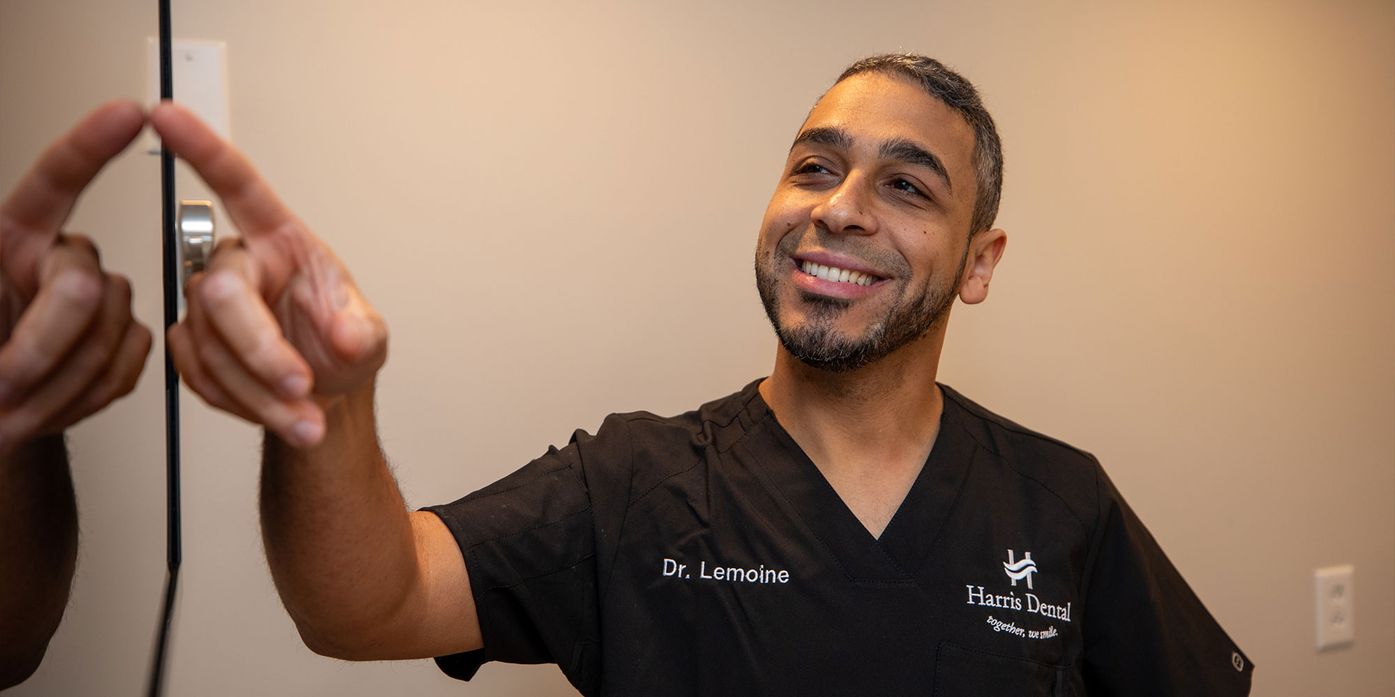 doctor going over dental procedure information