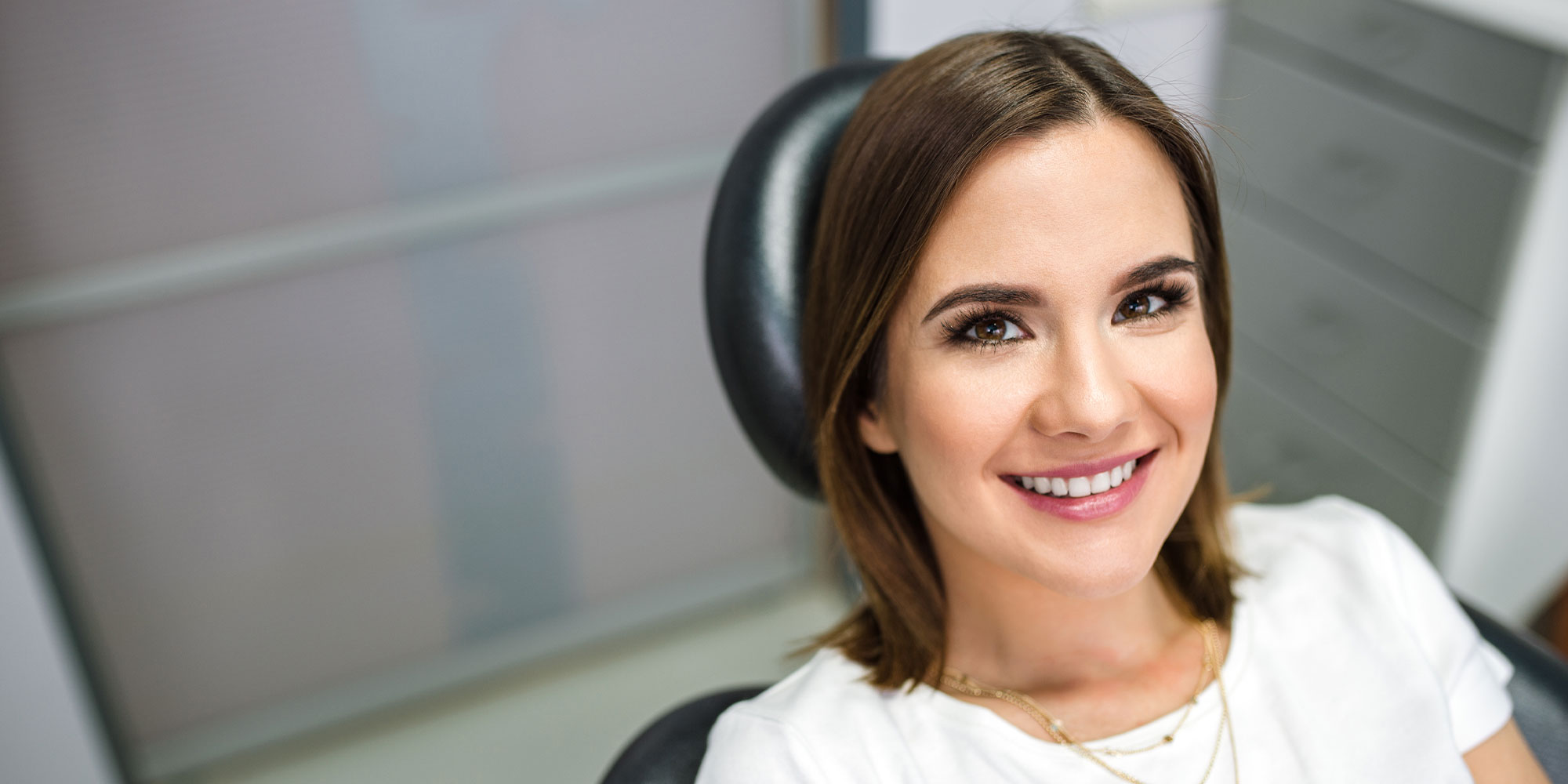 patient smiling and ready for dental treatment