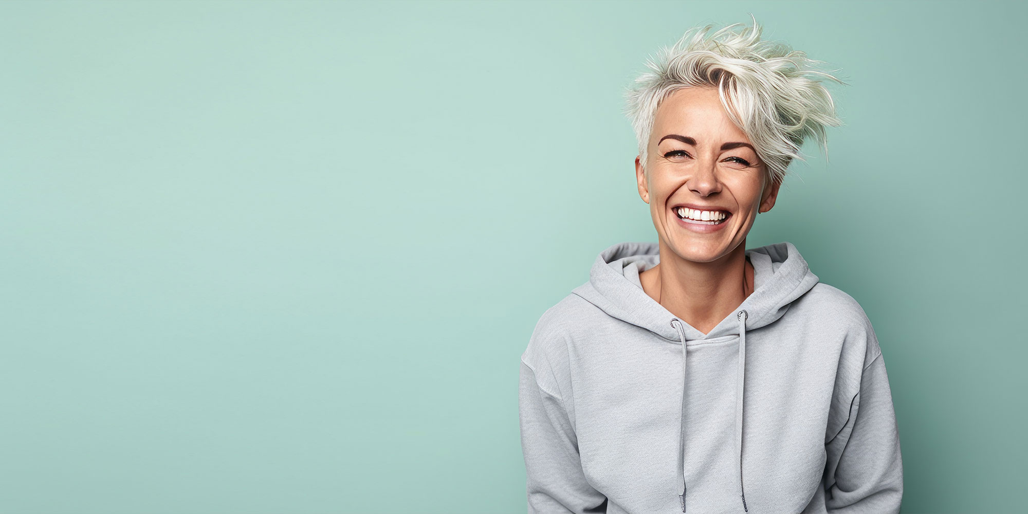 mature female smiling brightly for their photoshoot