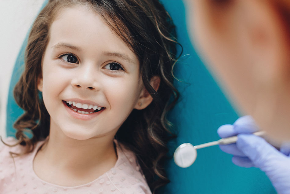Patient smiling brightly and ready for dental treatment