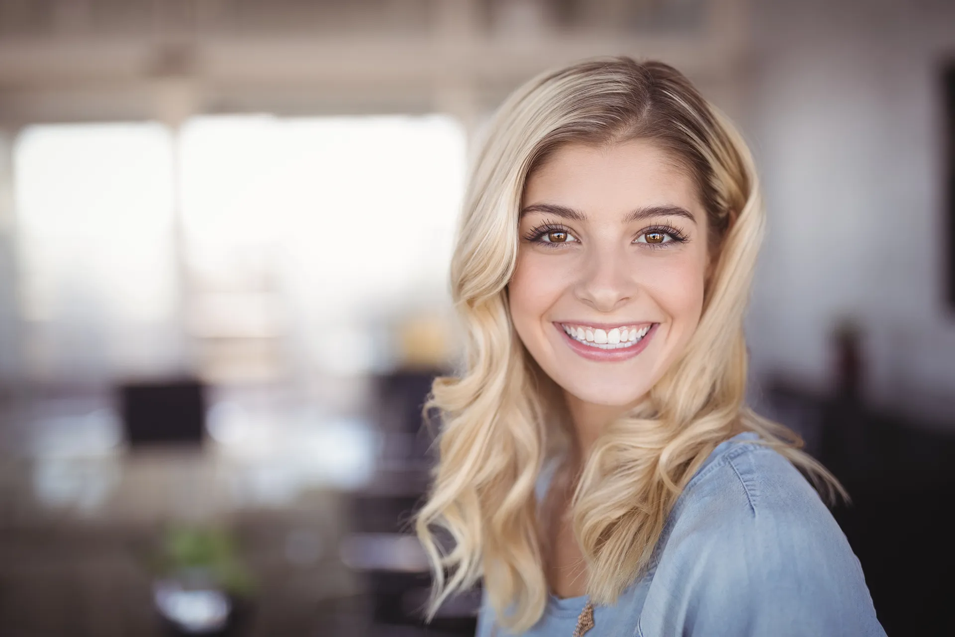 Woman smiling in the office